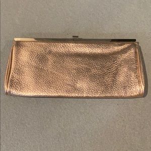 Rose gold J.Crew clutch